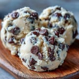 Close-up of chilled Greek Yogurt Cookie Dough with a soft, scoopable texture and visible chocolate chips.