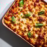 Penne noodles and beefy tomato sauce blend with creamy cottage cheese in a golden Cottage Cheese Protein Pasta Bake.